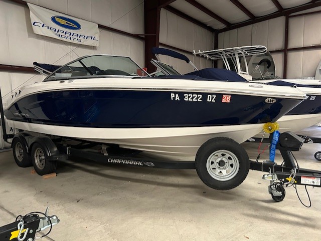 front side of black and white boat from Dinbokowitz Marine